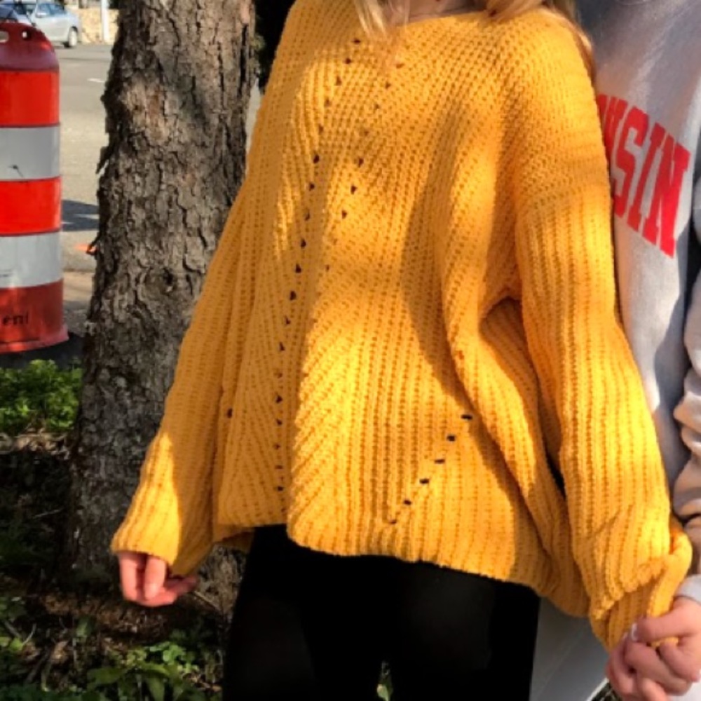 yellow sweater